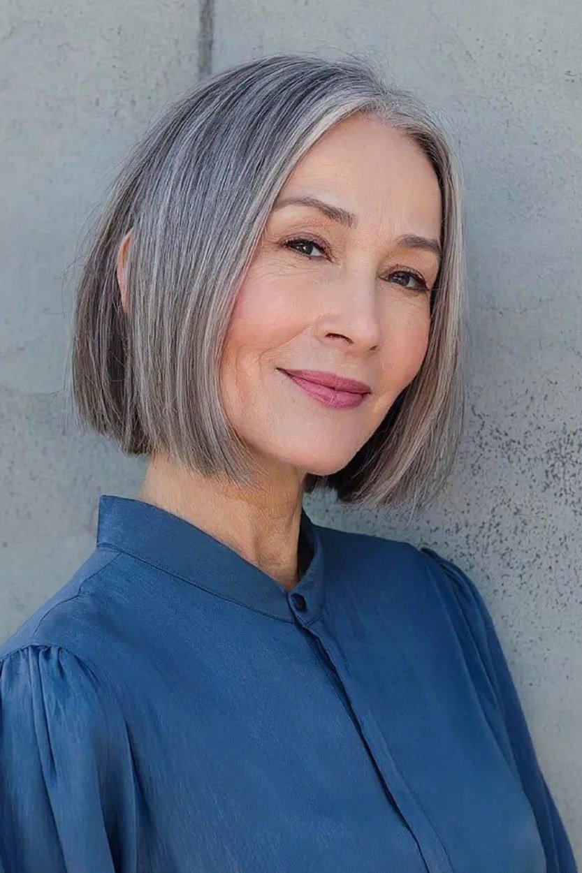 Sleek grey chin length bob for women over 60