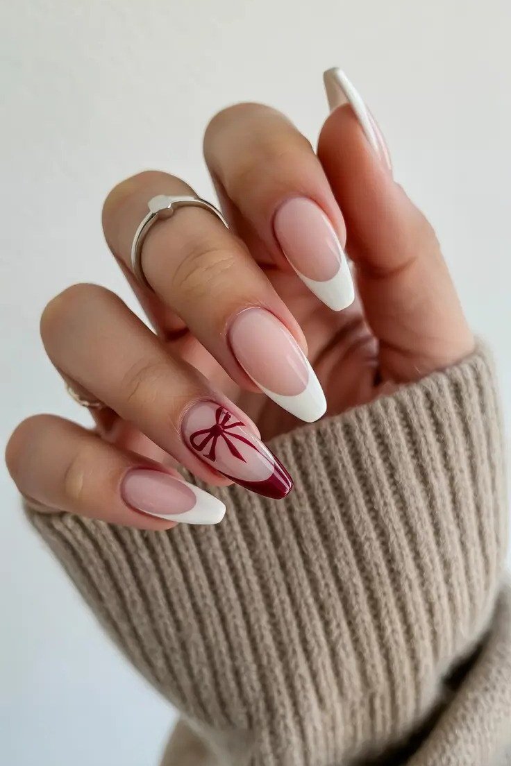 White French Nails with Red Bow Art, fun winter nail idea for women over 60