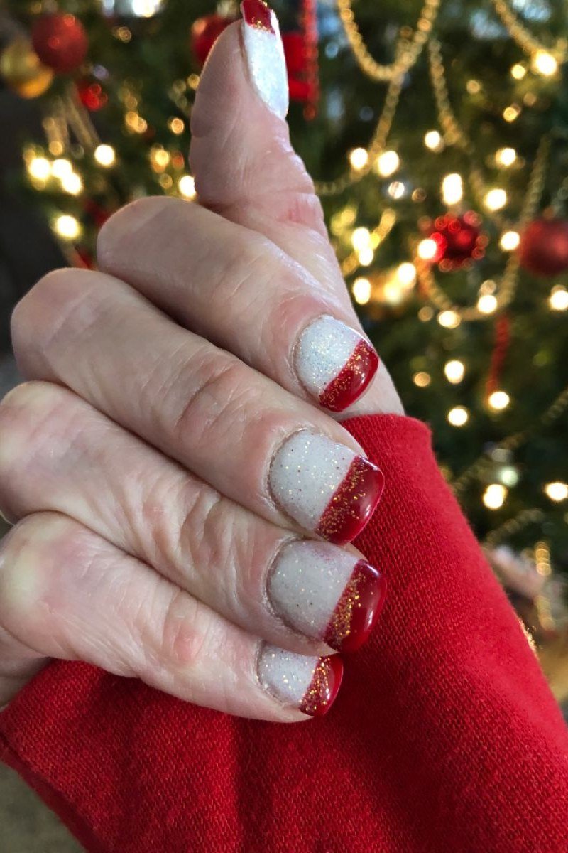 Silver and red french tips, Christmas tree background - Christmas nail design for older women