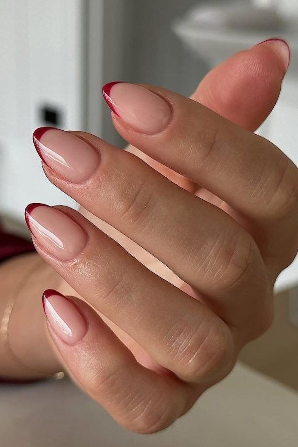 Burgundy french tip nails, sophisticated nail design for women over 50