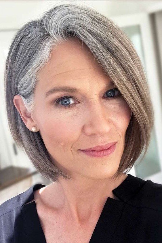 Sleek straight silver bob with sharp ends for women over 40
