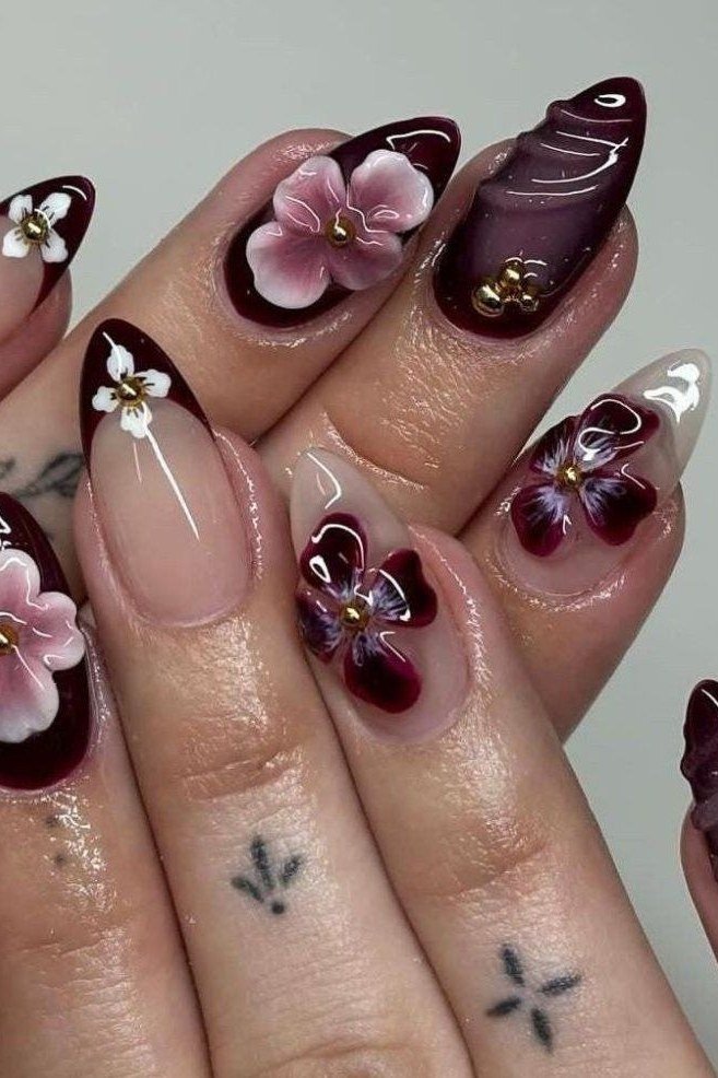 Dark burgundy nails with 3D floral and rhinestones for women over 50