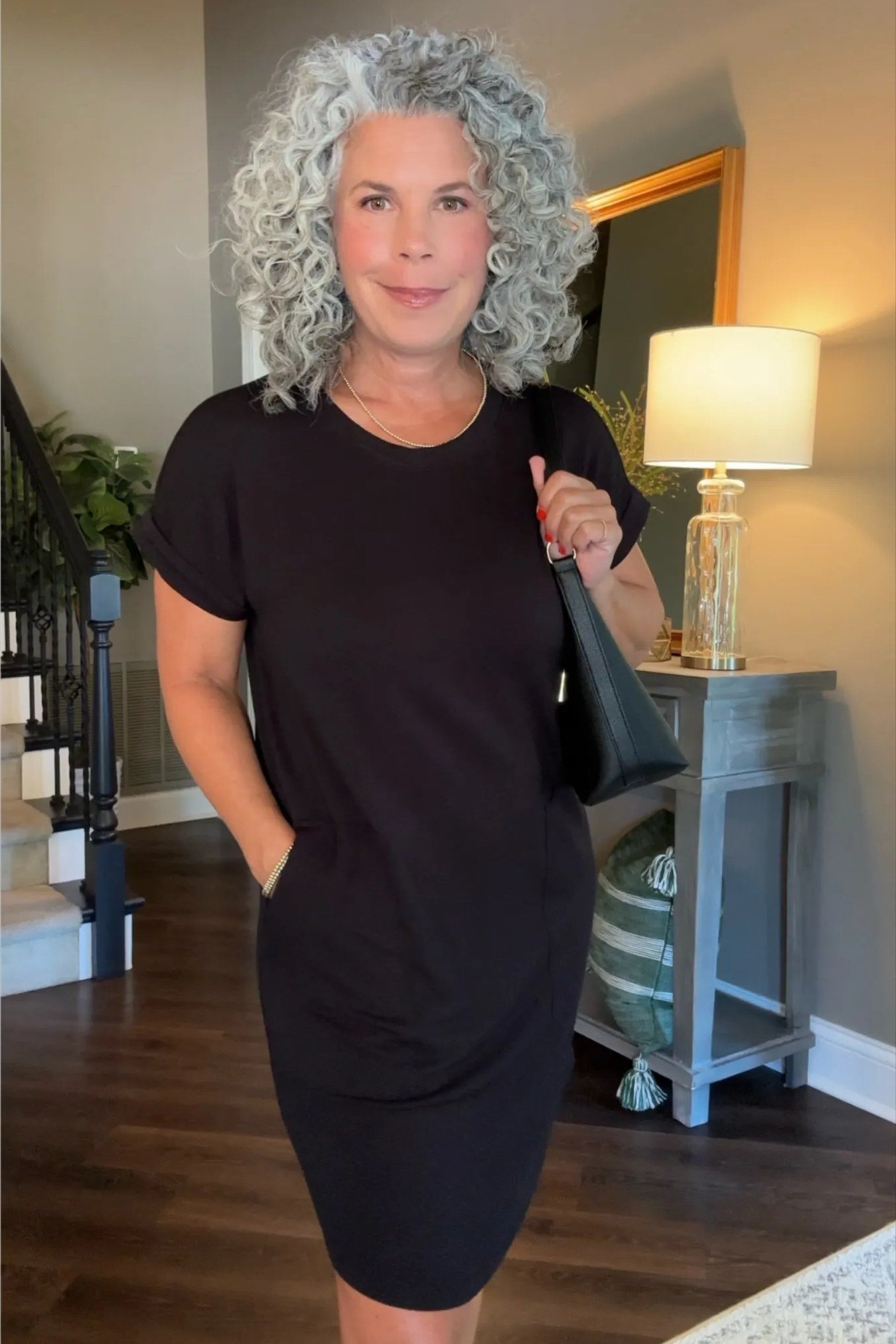 Relaxed black shift dress for women over 50