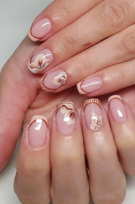 Sheer pink rose gold foil flecks mature hands nails for women over 50