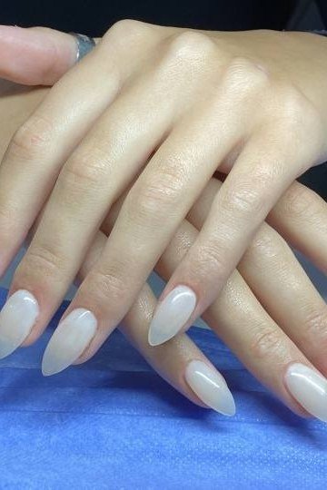 Sheer White Oval Nails - elegant nail art idea for mature hands, women over 50