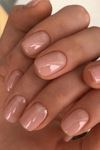 Warm Beige Nude, Clasped Hands - short nude nail idea for women over 50
