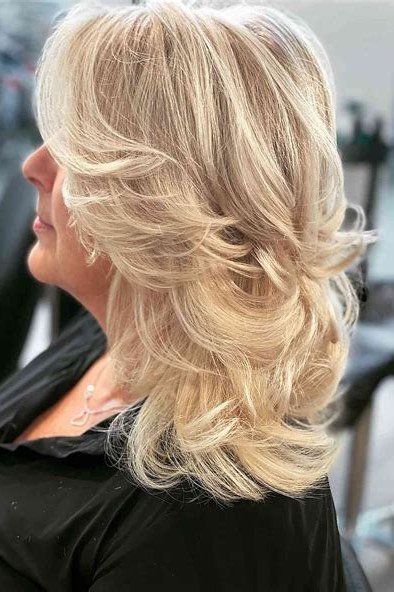 Voluminous Blonde Butterfly Cut - butterfly cut hairstyle for women over 60