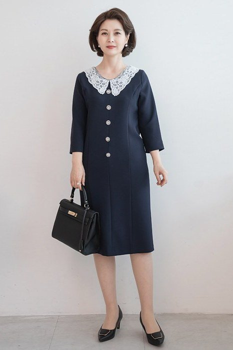 Navy button-front midi dress with white lace collar for women over 60