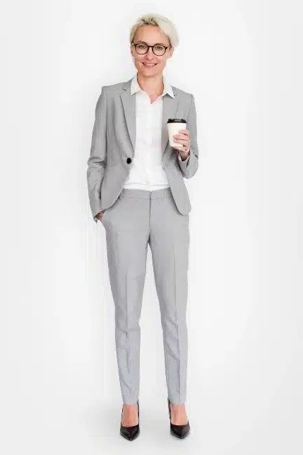 Work outfit for women over 40: light gray suit with white shirt