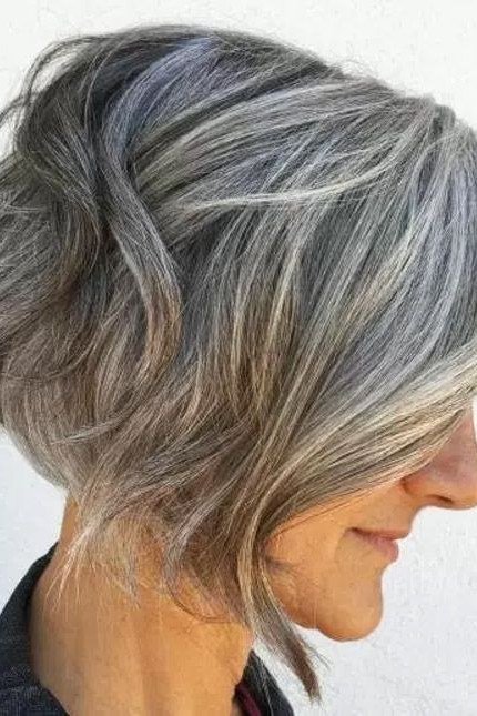 Asymmetric gray bob with deep side part