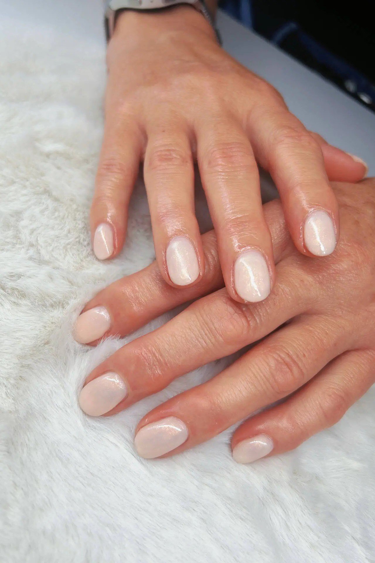 milky white short oval gel nails, clean white nail idea for older women