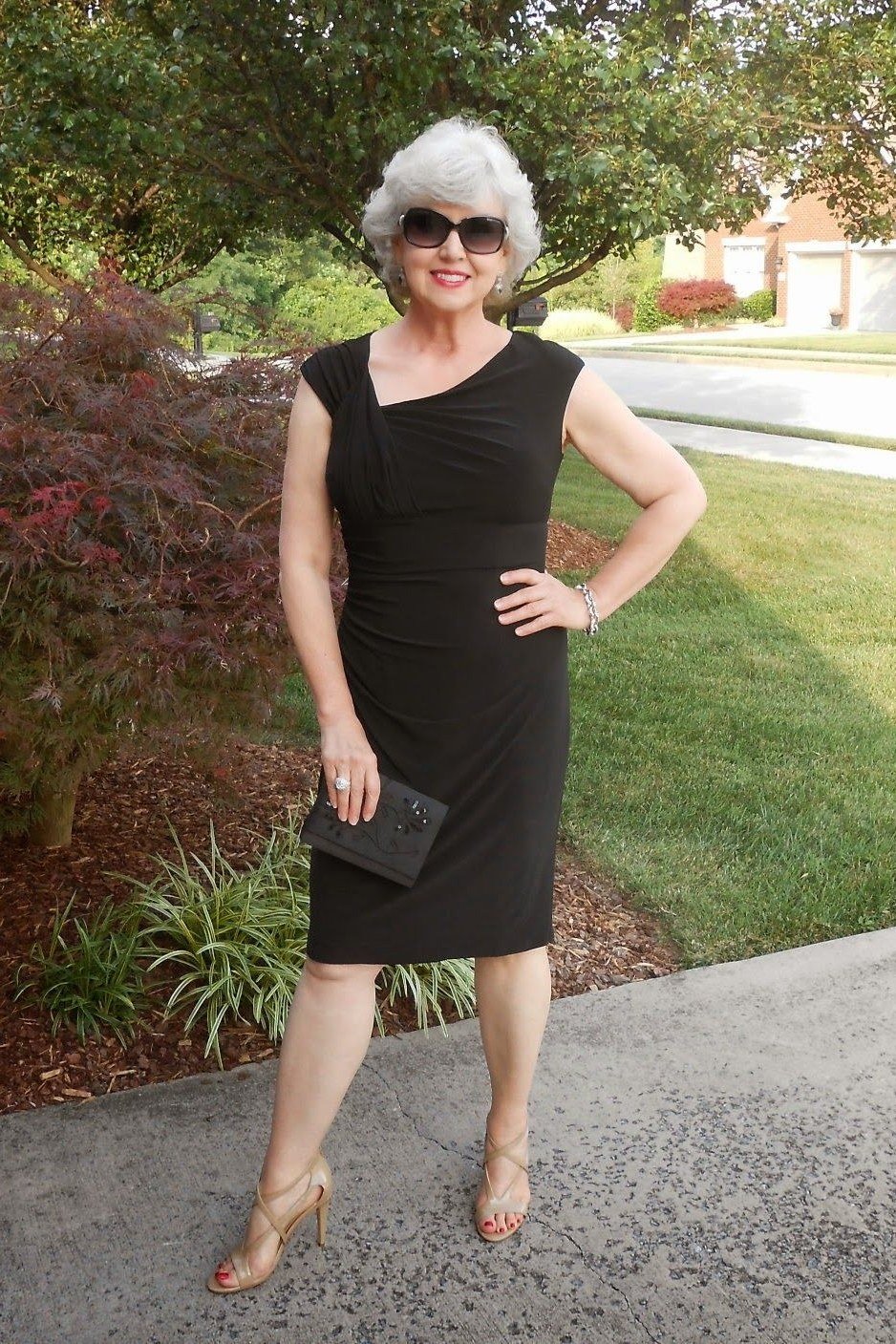 black dress, older woman in garden, elegant cocktail dress for women over 60
