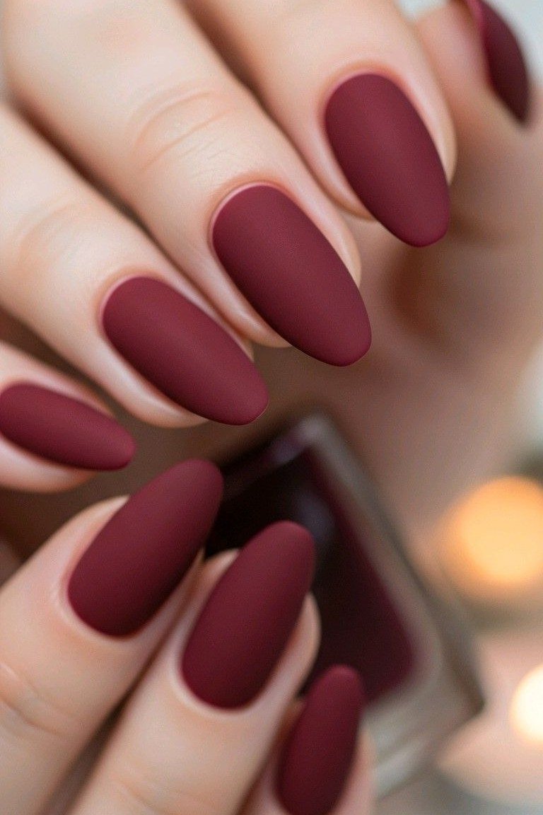 Matte burgundy almond, burgundy fall nail idea for women over 60