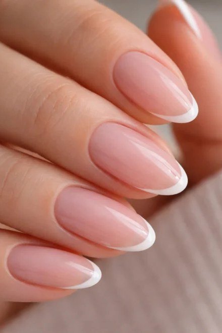 Crisp Almond Statement - micro french manicure with ultra-thin tip line, elegant nail design for women over 50