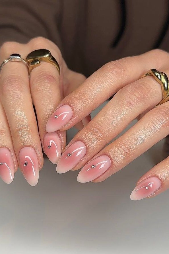 delicate pink french tip almond nails