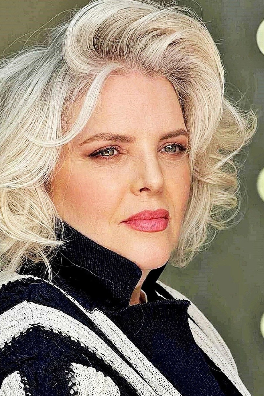 Glamorous Voluminous Blonde Bob - short wavy bob hairstyle for women over 60