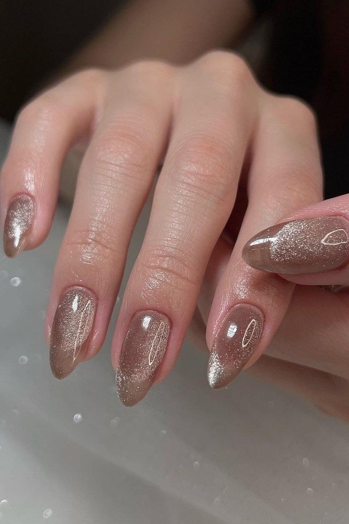 dark taupe cat eye nails