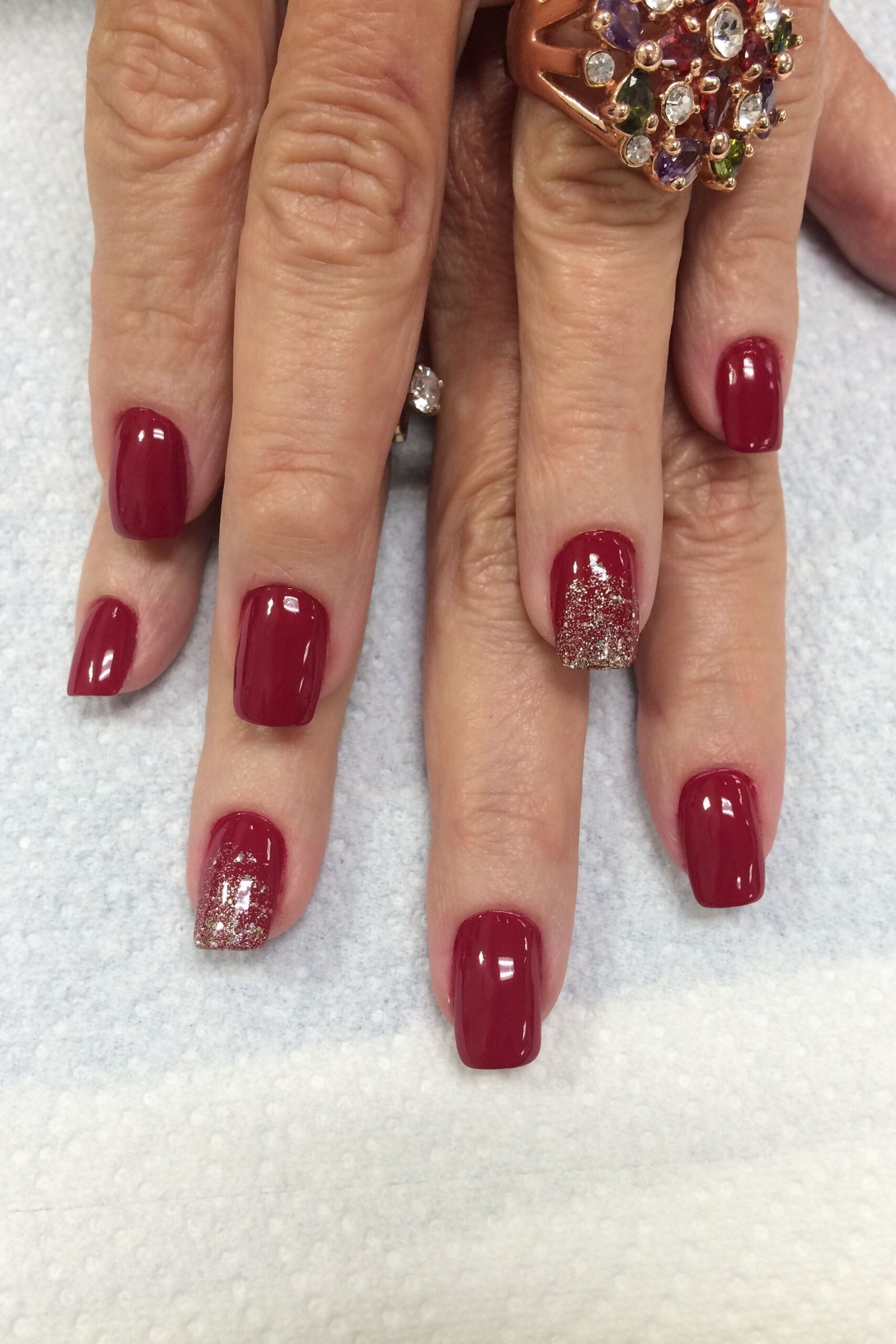 Burgundy Nails with Glitter Accent for women over 60