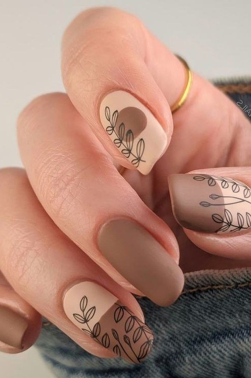Nude matte with brown leaf line art almond, elegant fall nail design for women over 40