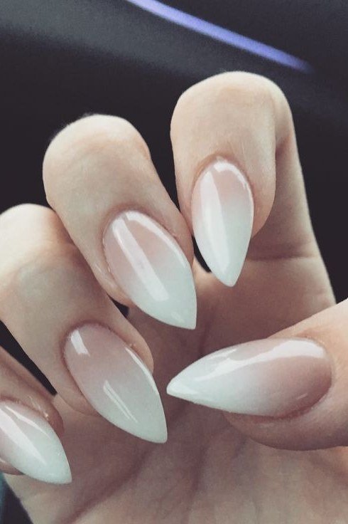 white nude baby boomer ombre on long almond nails