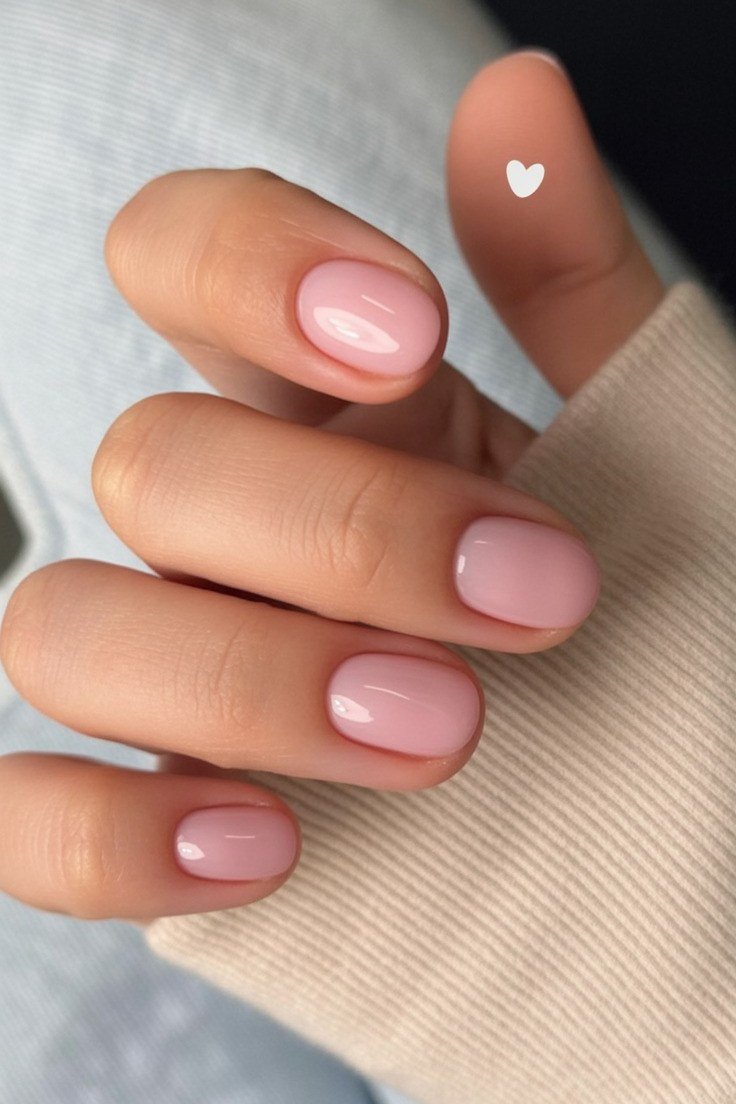 Sheer Pink Heart Accent - short nail design for women over 60 that makes nails look longer