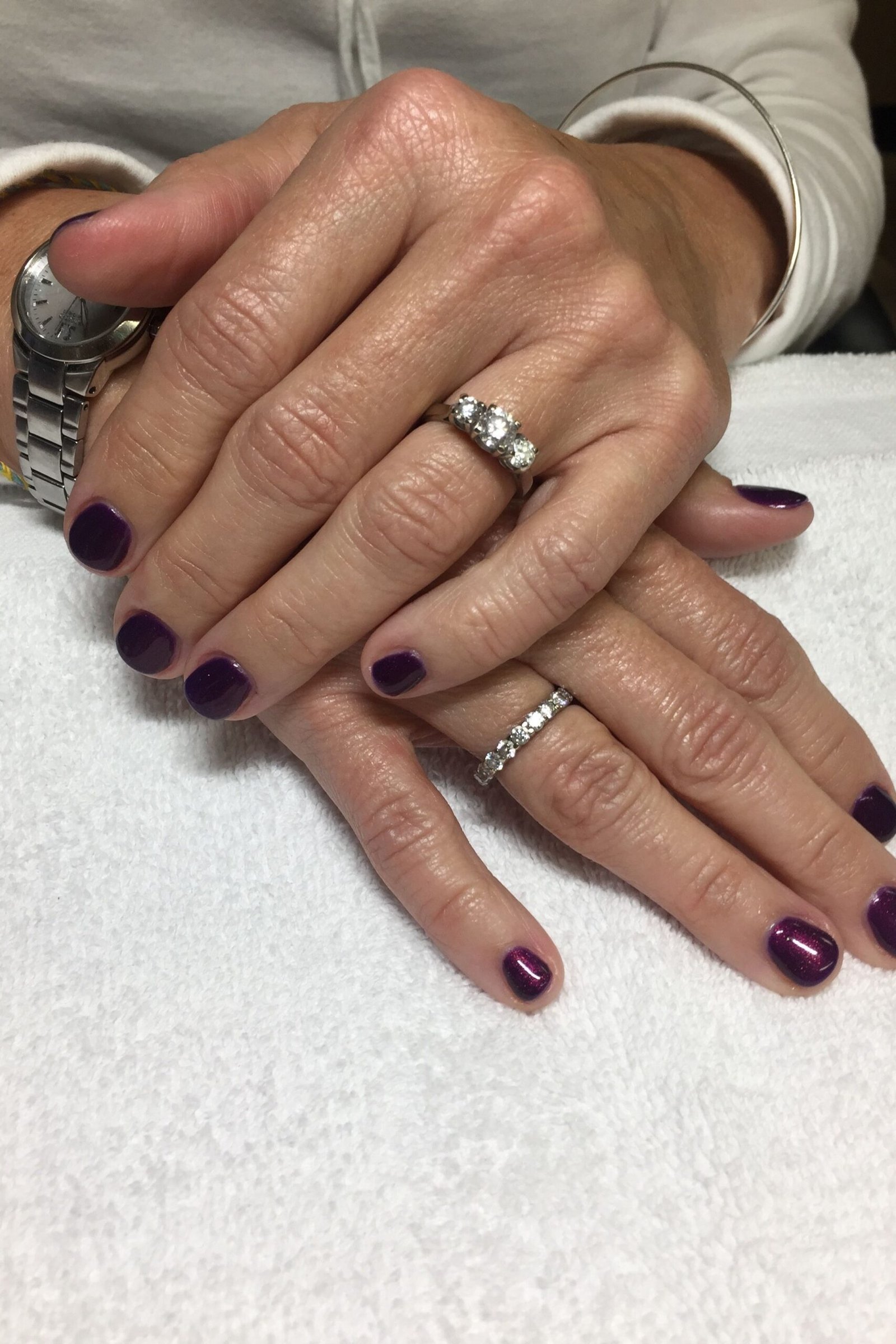 Dark Plum Manicure with Rings for women over 60