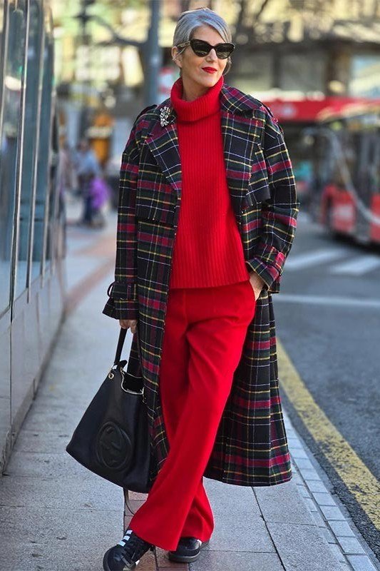 Red turtleneck with long plaid coat fall outfit idea for women over 60
