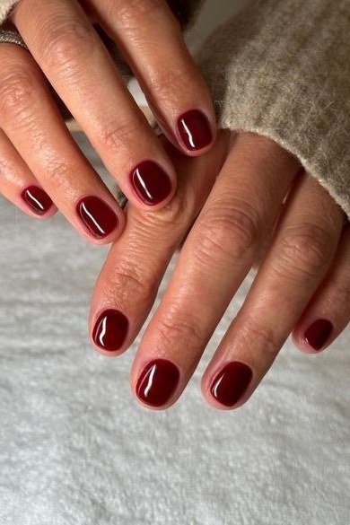 Oxblood nails with sweater cuff
