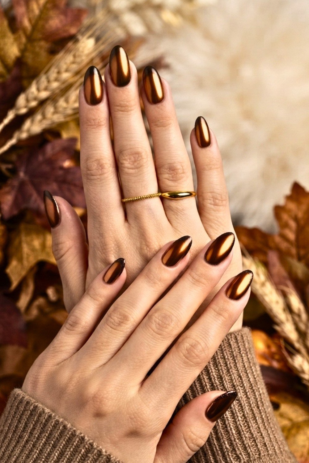 Bronze chrome almond with fall leaves, elegant fall nail design for women over 40