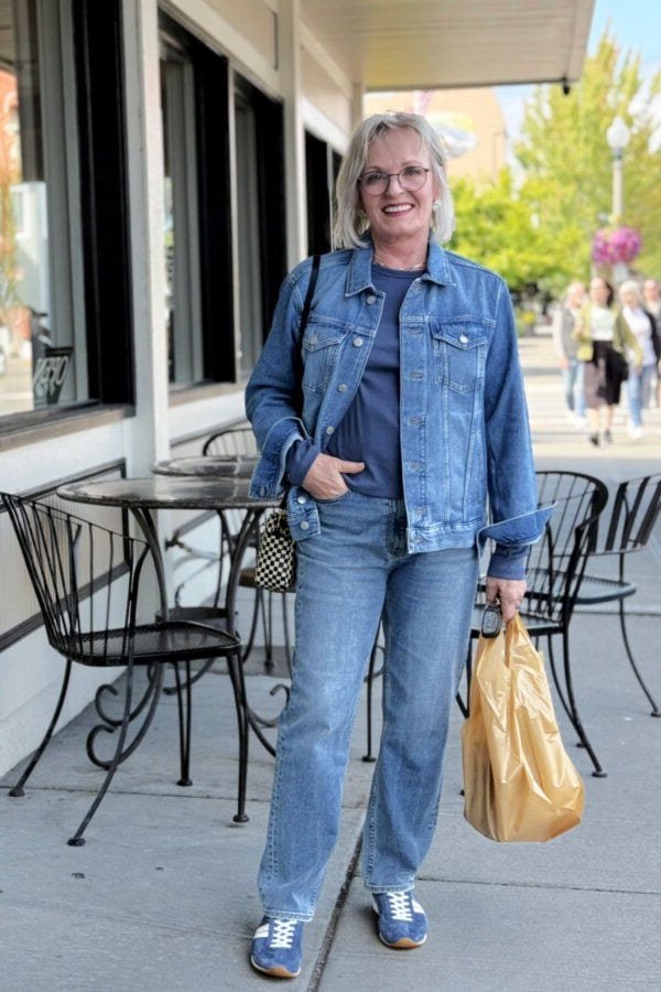 Easy casual outfit idea for women over 50: classic denim jacket and jeans, older woman everyday style