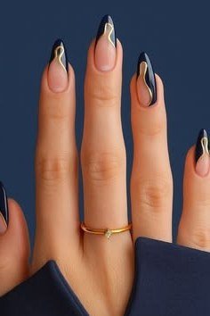 Black French on Almond Nails - elegant nail art idea for mature hands, women over 50