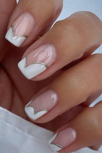 Nude French Tips with White and Gold - elegant nude nail design for women over 60