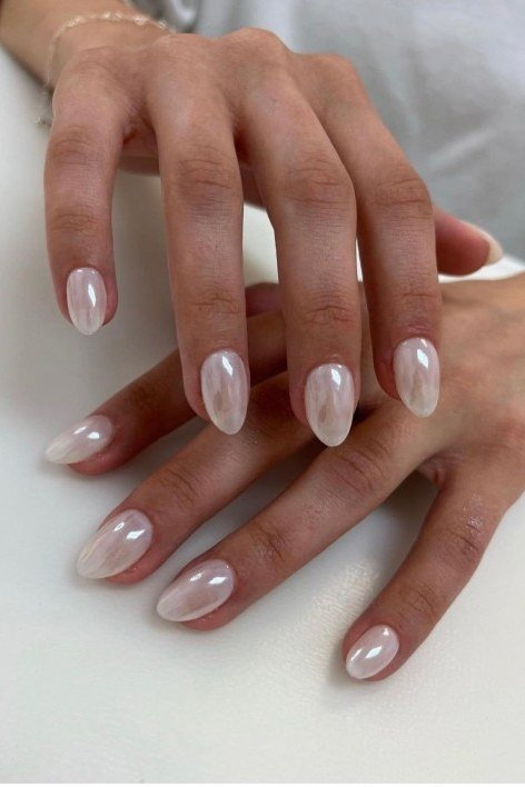 Pearl chrome milky white nails on both hands