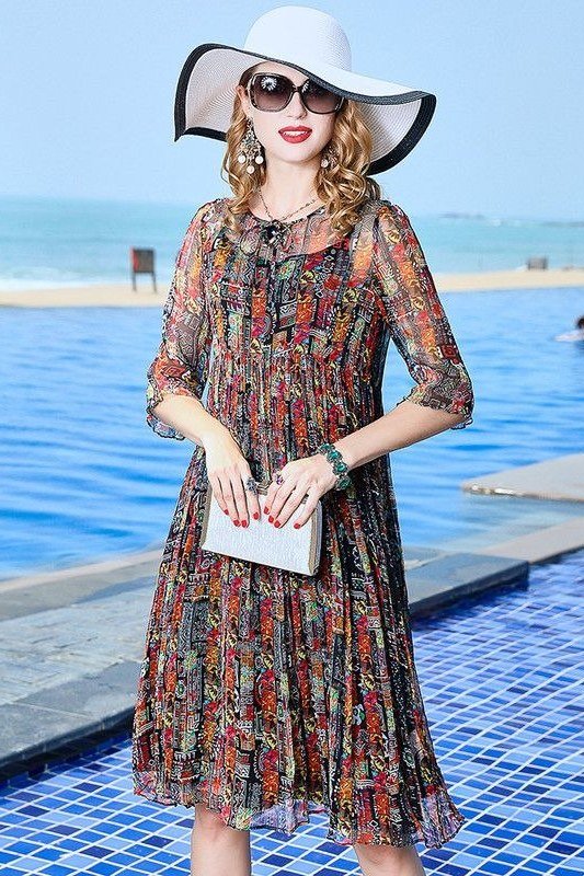 Breezy summer dress for women over 60: mint floral midi