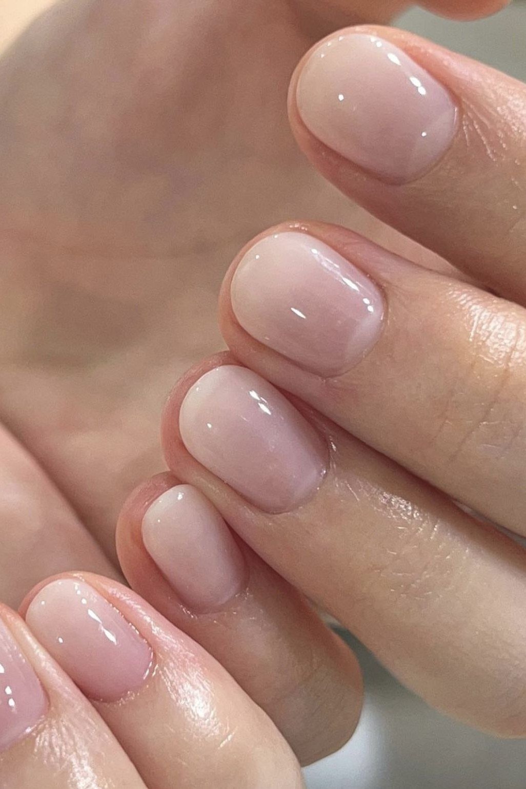 Milky Pink Rounded - short nail design for women over 60 that makes nails look longer