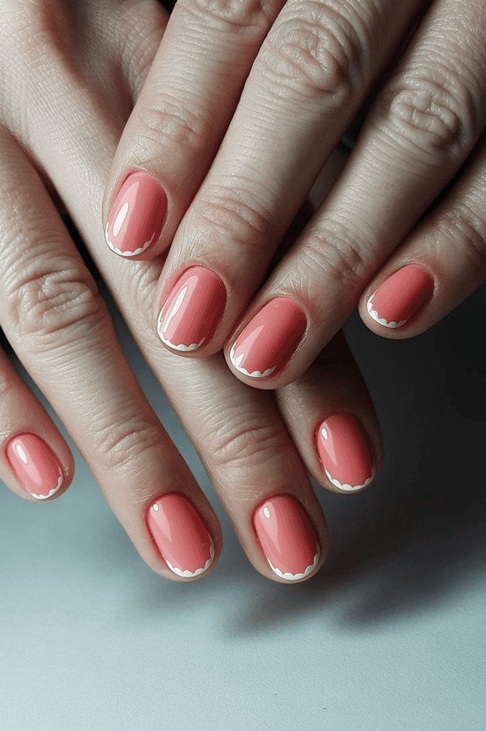 Fresh coral nail polish for women over 60