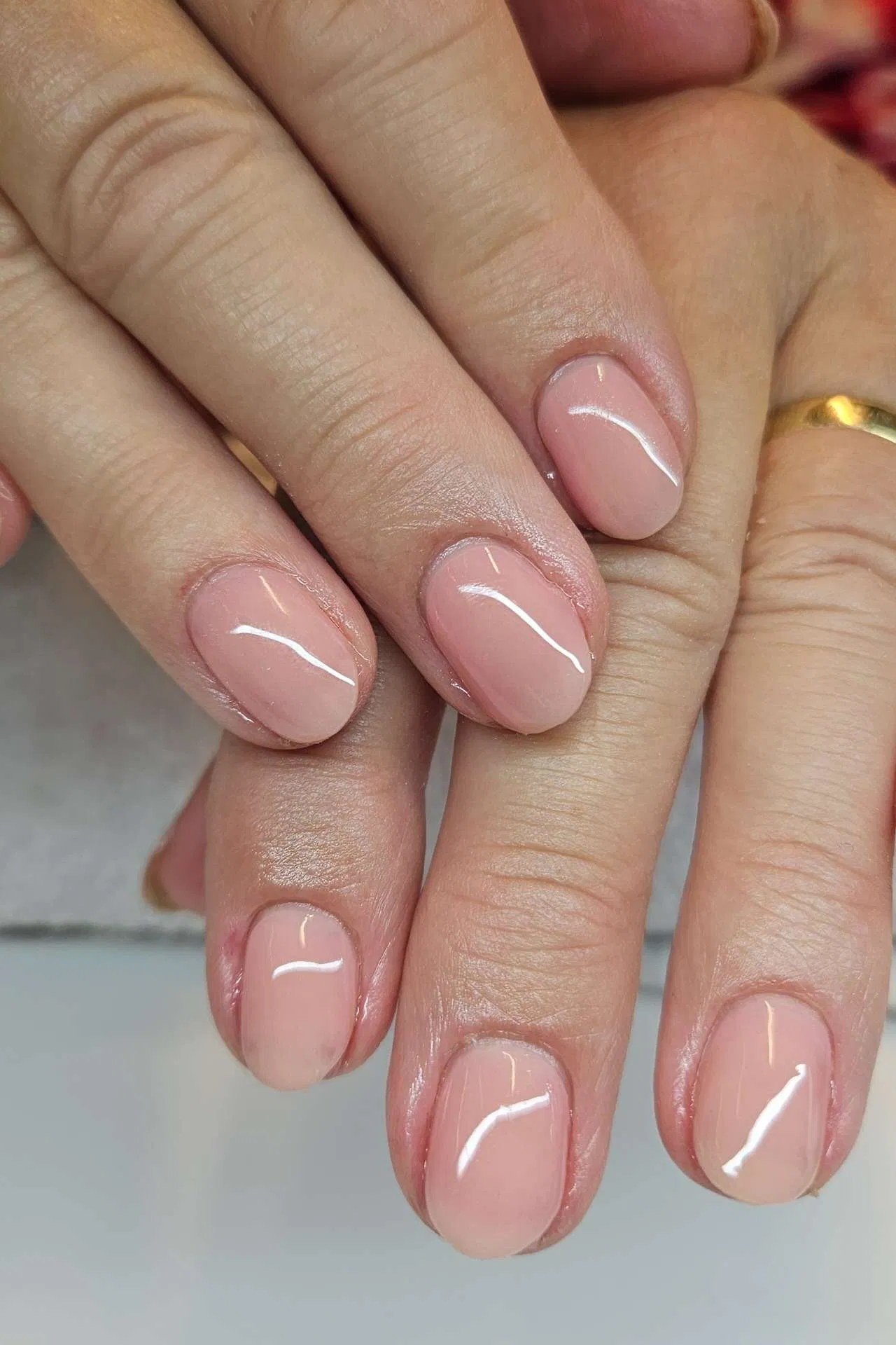 Milky blush pink gel nails for older women