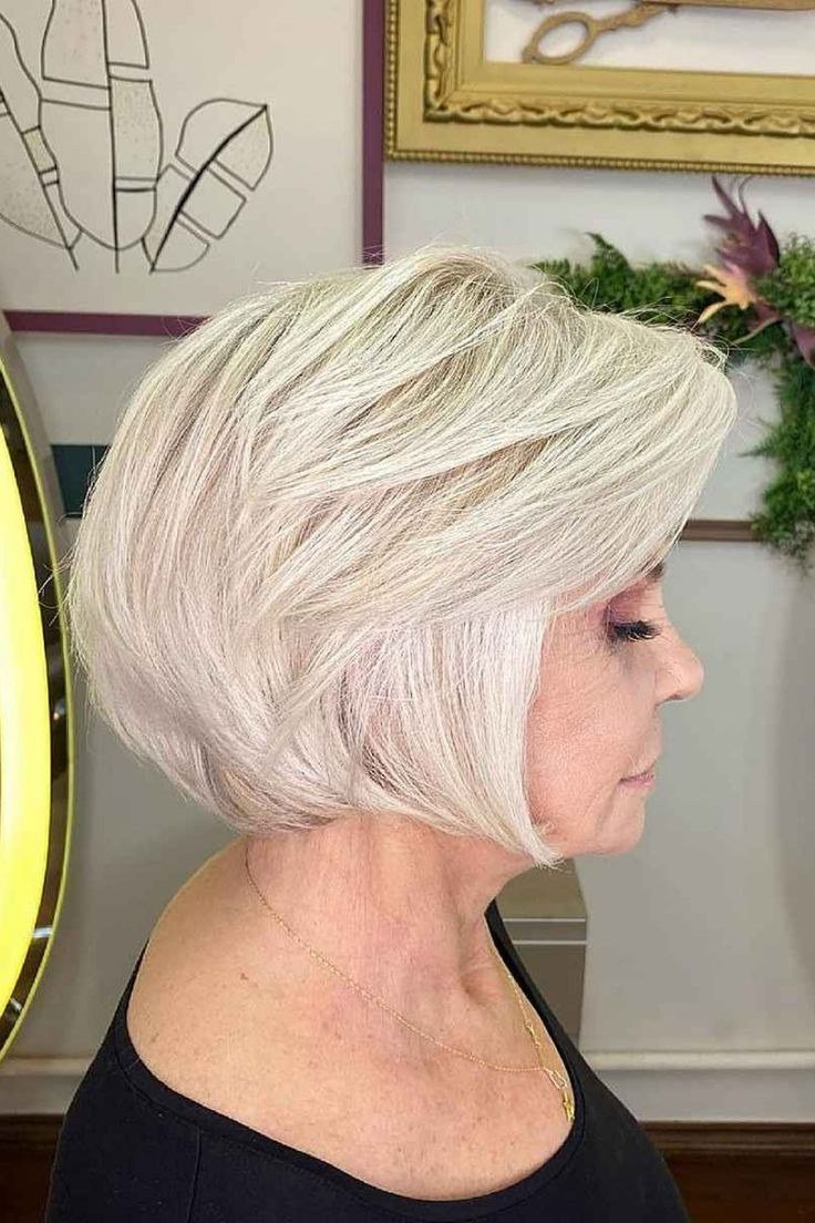 3. Classic White Pixie - wash and wear hairstyle for older women