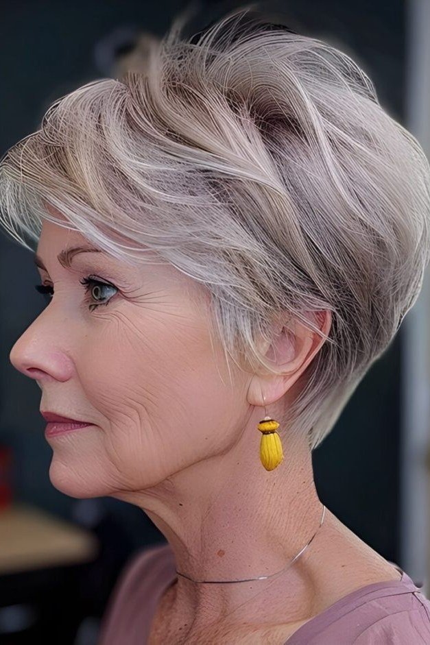 Voluminous silver pixie haircut for women over 50
