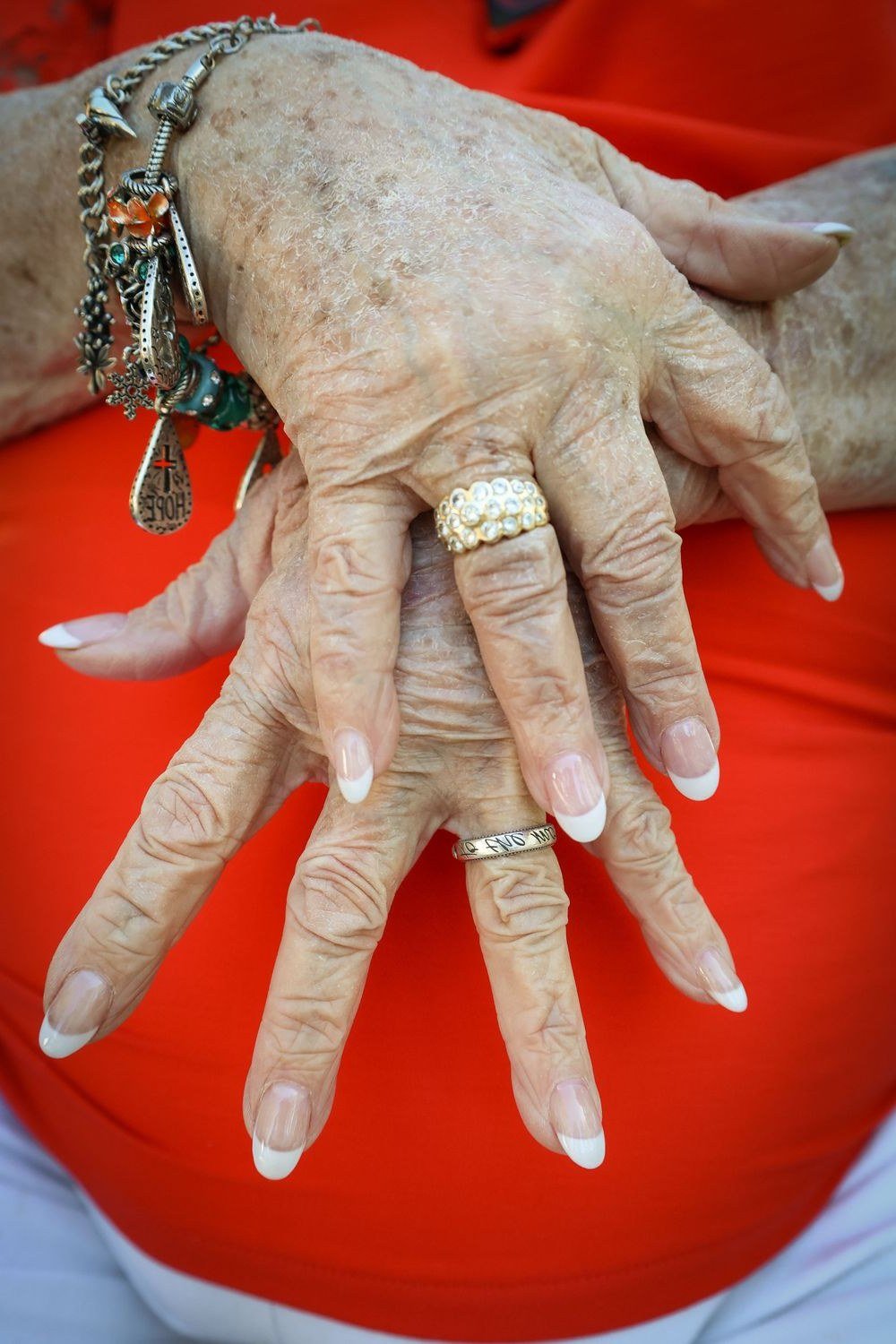 Classic white french tip manicure for older women