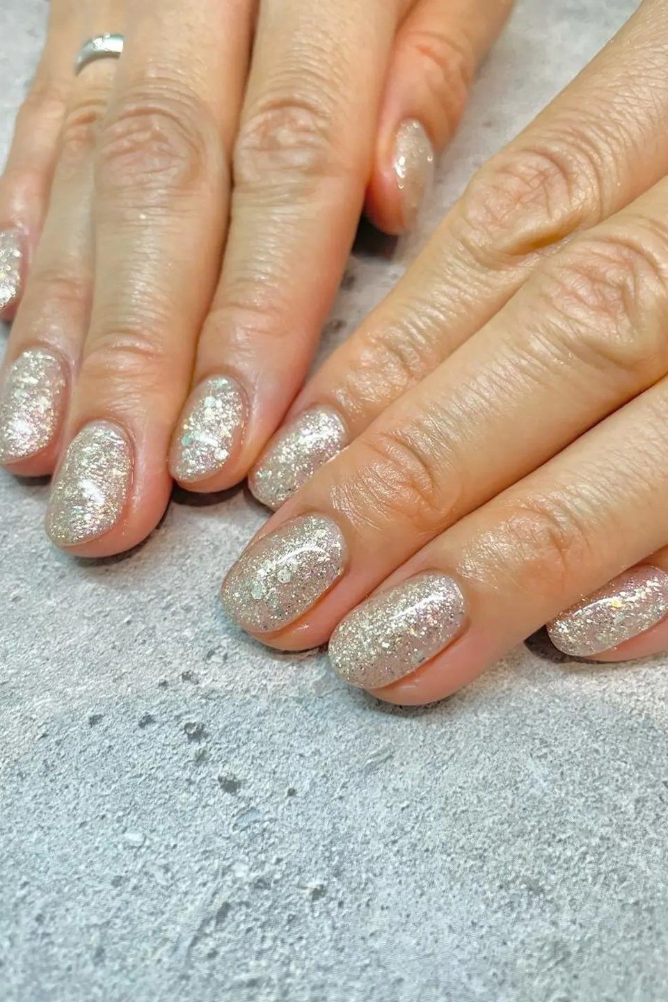 Silver Glitter Short Nails - silver glitter short mature hands, glitter winter nail design for women over 60