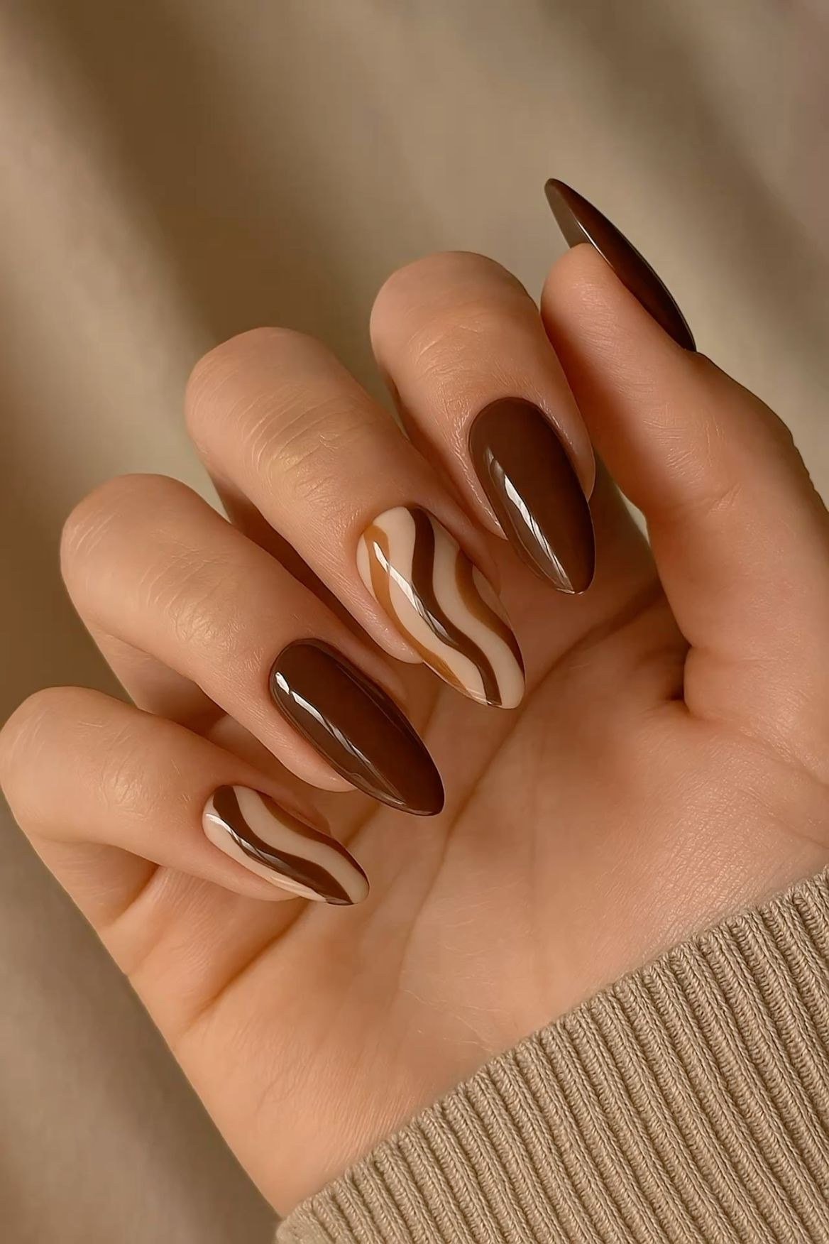 Espresso Almond Nails with Nude Swirl, chocolate brown fall nail design for women over 60