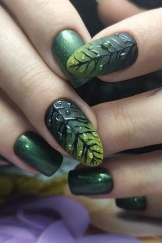 14. Deep Green Nails With Hand-Painted Leaves - Thanksgiving nail art idea for women over 50