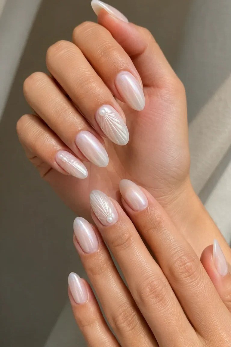 Pearlescent Nude Almond Nails - pearl finish nail idea for women over 60