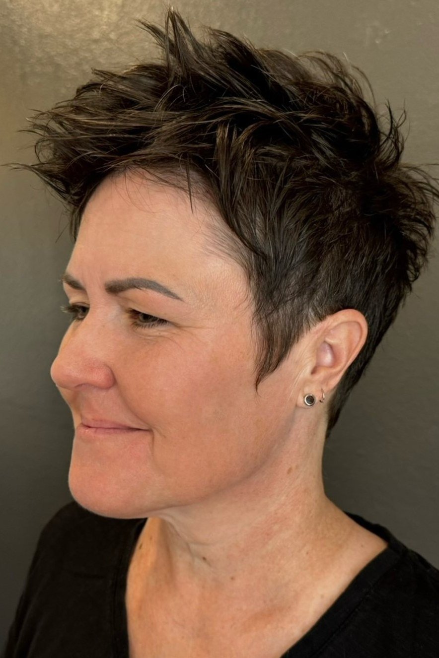 Edgy dark spiky pixie haircut for women over 50