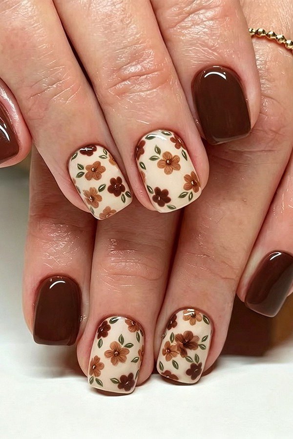 Deep Chocolate Brown Nails with Floral Accents, fall nail color idea for women over 50