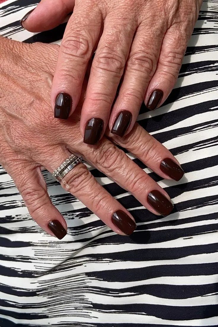Dark Chocolate Plum Nails - short nail design idea for women over 50