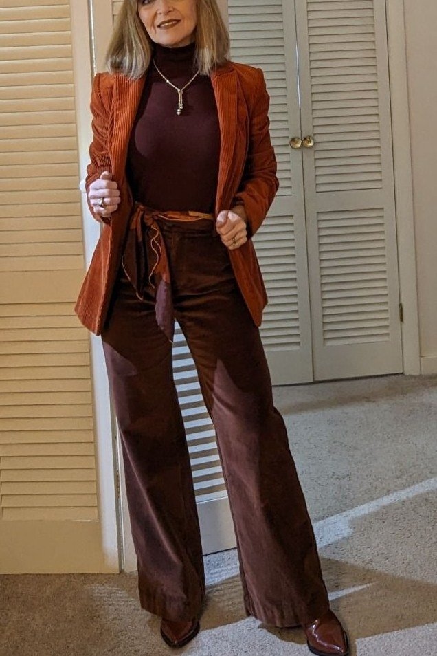 Rust blazer with brown turtleneck and chocolate wide-leg trousers