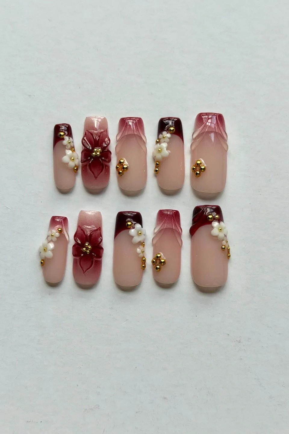 Nude burgundy press on nails with pearl accents for women over 50