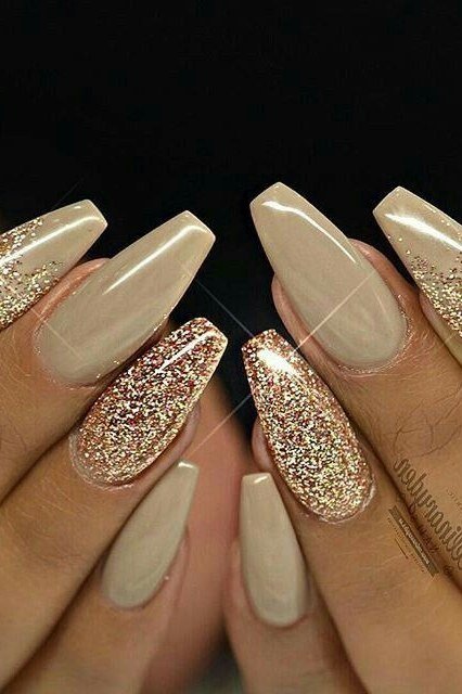 Beige Nails with Gold Glitter Accents - nude nail art idea for women over 40